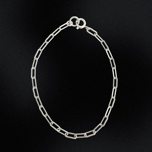 Experience elegance and sophistication with our Sterling Silver Bracelet. Adorned with a delicate Small Paperclip Chain, this bracelet is the perfect addition to any outfit. Made from high-quality sterling silver, it exudes luxury and style. Elevate your jewellery collection today and make a statement with this stunning bracelet.