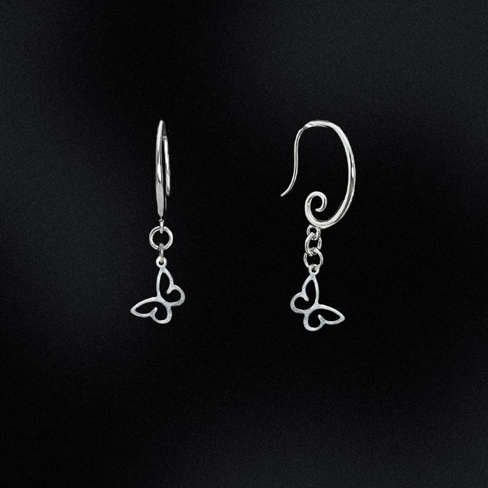 Crafted from premium quality sterling silver, these earrings boast a striking swirl earring hook design that gracefully adds a touch of movement to the piece. The hooks are easy to insert and secure, ensuring a comfortable and hassle-free wearing experience. The stunning swirl earring hook adds a touch of unique and modern flair, while the butterfly symbolises transformation, growth, and the beauty of nature, making it an excellent addition to any jewellery collection.