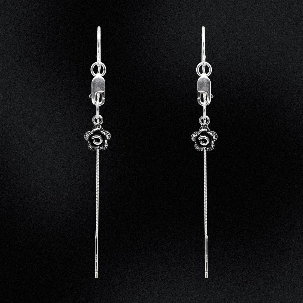 These Sterling Silver Rose Threader Earrings are a beautiful addition to any jewellery collection. Made with high-quality sterling silver, these earrings are both elegant and durable. The unique threader design allows for easy wear and a comfortable fit. Enhance your style with these timeless earrings that are perfect for any occasion.